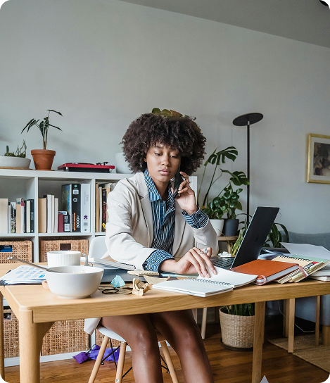 Photo of a woman working at her office desk